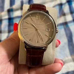 This is a Marc Anthony men’s watch.